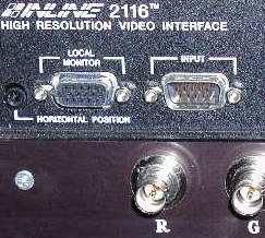 Panel closeup showing local monitor output and VGA input and RGB connectors