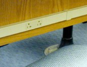 Outlets under table