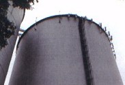 Cylindrical water tank with antennas along the top