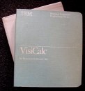 Blue cloth binder with VisiCalc on cover with slip case