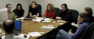 Eight people around a table