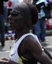 Woman running breathing hard