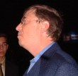 Bill Gates (a poor photo unfortunately) with a jacket and blue shirt