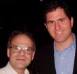 Bob with no jacket and white shirt with Michael Dell smiling
