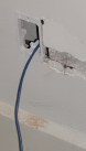 Wall with hole and wire sticking out