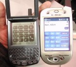Treo and MS phone on my hand -- Treo is smaller