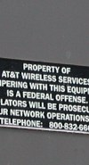 Property of AT&T Wireless Service, tampering with this...federal offense...