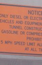 Sign: Notice: Only Diesel or electric...vehicles...gasoline or compressed...prohibited