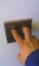 Fingers on two light switches