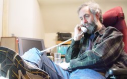 Dan leaning back in chair